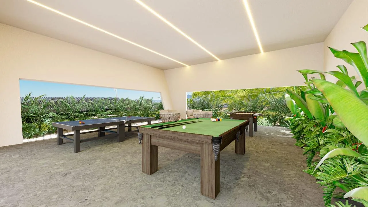 Sala de jogos do L'Harmonie com mesa de bilhar